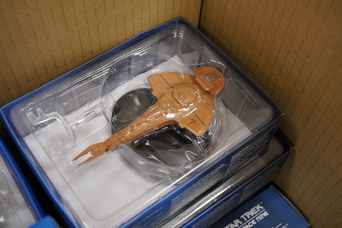 Twenty-five boxed Star Trek Eaglemoss Collections magazine issue starship models, with the associated magazines (unchecked)